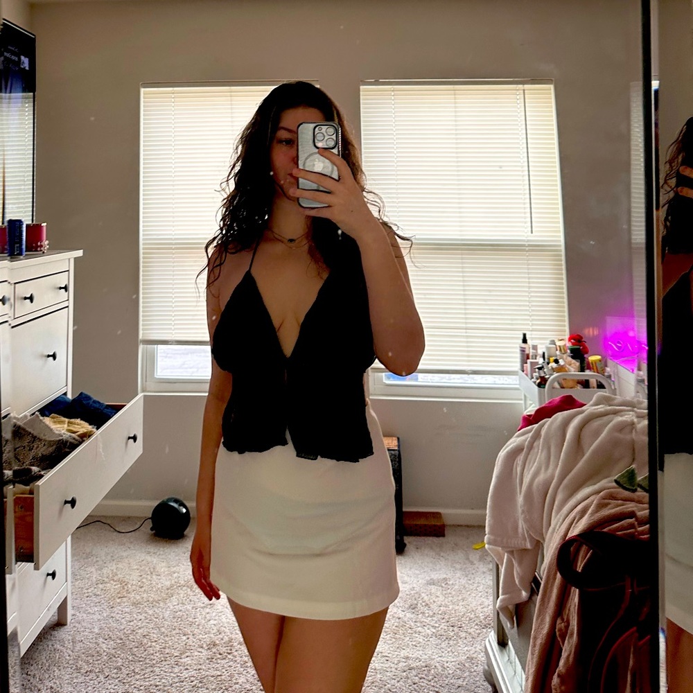 Fun black mesh going out top. Sexy and fun night out top!